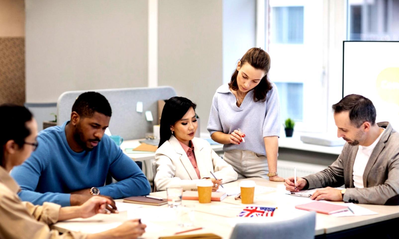 Collaborative financial education workshop with partners discussing budget communication strategies